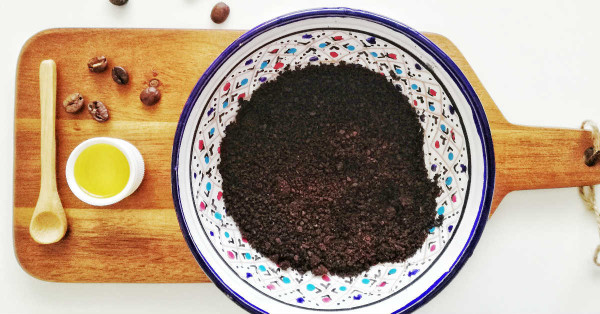 Scrub skin with coffee grounds